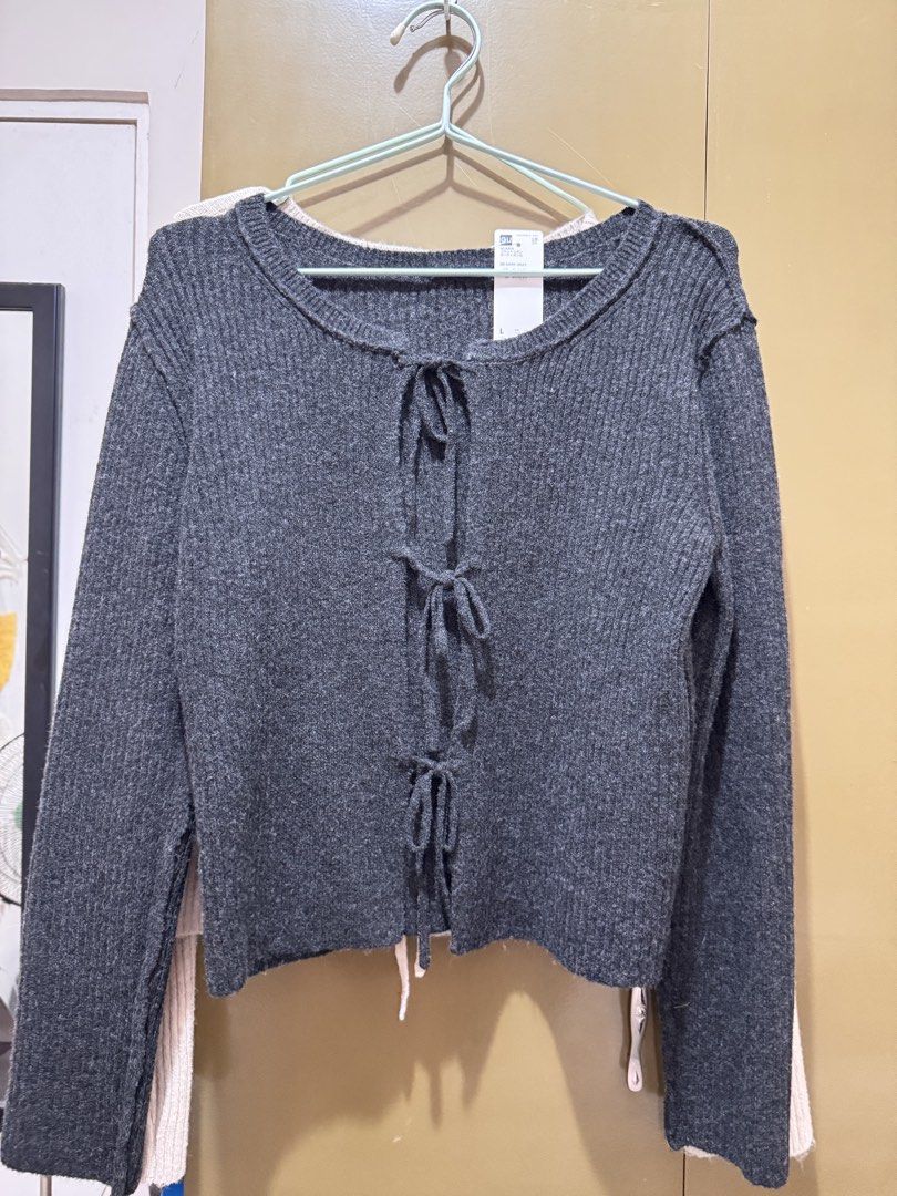 GU Ribbed Knit Tie Front Cardigan (Category: Coats, Jackets and Outerwear) located in Lucena. Submitted by mariefleur (Listing ID 1442110231, Image 1). Description: 600 EACH Ribbed Knit Cardigans Size LARGE on each tag BRAND NEW .