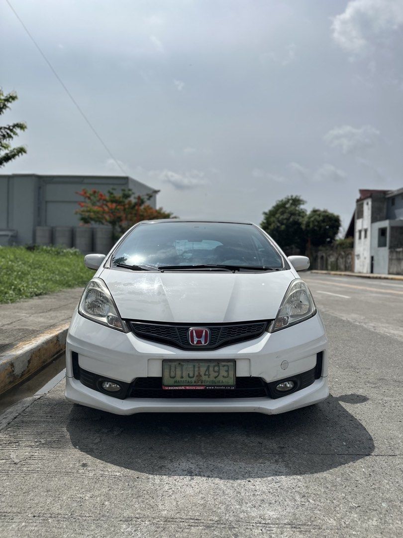 Honda Jazz 1.5 S i-VTEC (A) (Category: Used Cars) located in Antipolo. Submitted by judeballa (Listing ID 1441980301, Image 2). Description: Honda Jazz 2012 1.5 A/T GE MMC body Original and untampered odo at 112k Tuesday coding Newly LTO registered Personal owned Guaranteed not for buy and sell Garage queen most of her life with us Clear bluish tint wrap around Very well maintained (all services, maintenance and parts receipts intact) Super cold 