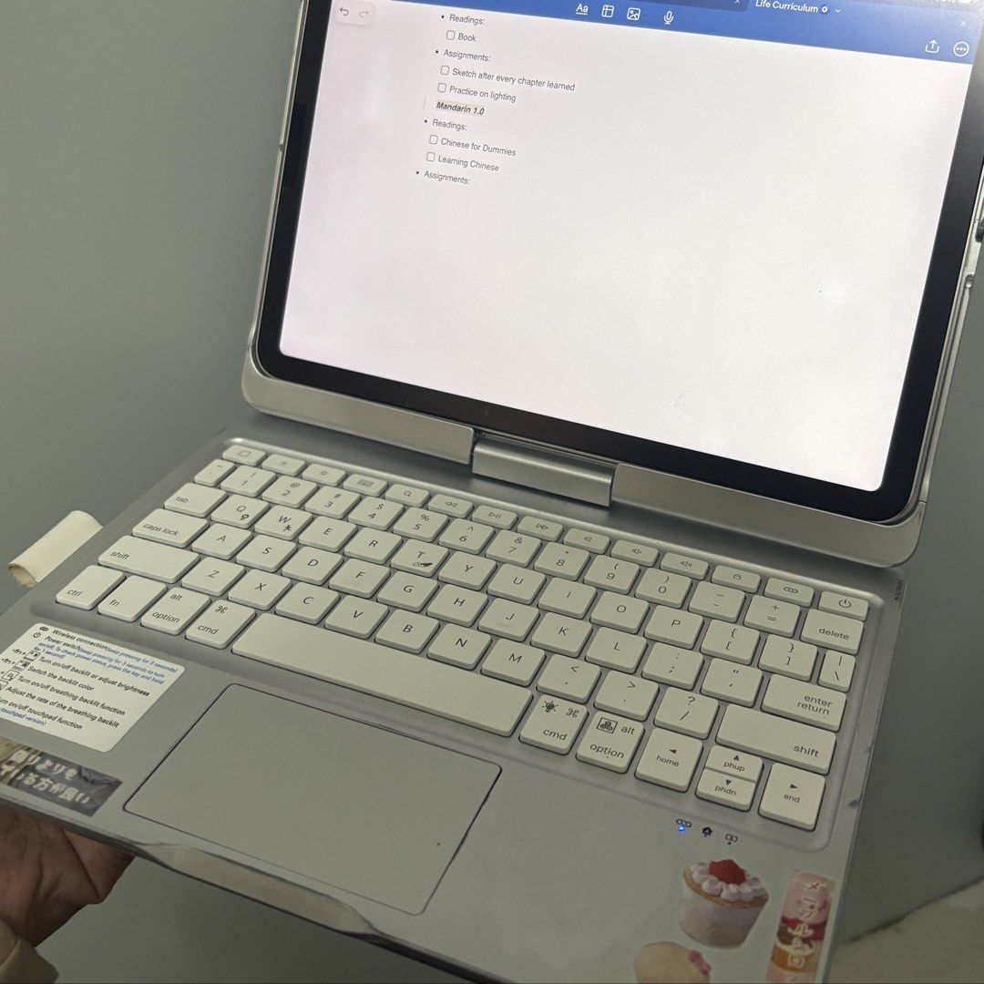 Ipad Rotating Keyboard (Category: Cases & Sleeves) located in Mandaluyong City. Submitted by satinjuniper (Listing ID 1442077723, Image 1). Description: - Fully functional keyboard for ipad models - fits ipad air 4/5th gen and ipad pro 11 - rotating, easy use from ipad alone to a mini laptop - see pics for flaws - connects easily and no issues with keyboard - personally think it's cutesy - rfs: need funds (personally wouldn't let this go but here