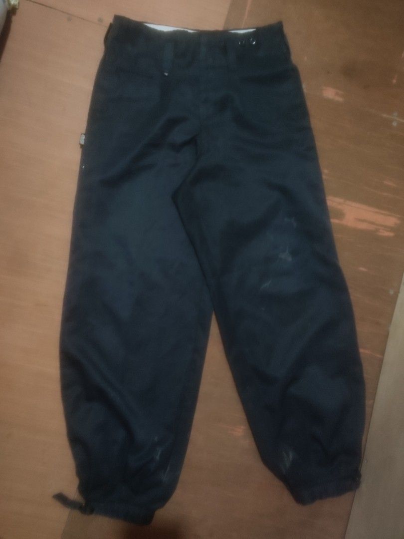 Japanese Construction Worker Pants with Paints stains (Category: Other Bottoms) located in Baybay. Submitted by thriftits00 (Listing ID 1442128711, Image 1). Description: - Black pants - White label on the side with writing - Tie details at the bottom.