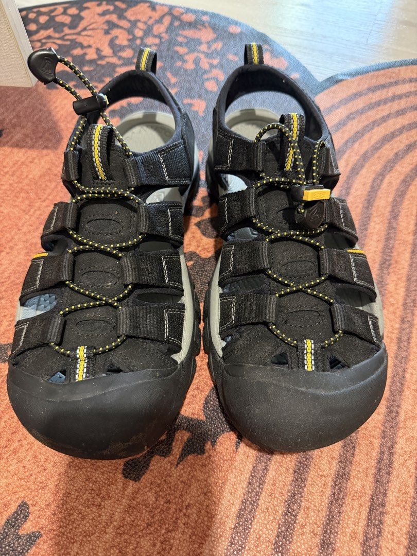 KEEN Newport H2 Water Sandals Men's Size 9 (Category: Casual shoes) located in Singapore. Submitted by jasmine213 (Listing ID 1441987006, Image 1). Description: - KEEN Newport H2 Sandals - Color: Black with Yellow Accents - Size: US Men's 9 - Features: Quick-dry webbing, Lace-lock bungee system - Ideal for: Hiking and water activities - Origin: Made in Cambodia.