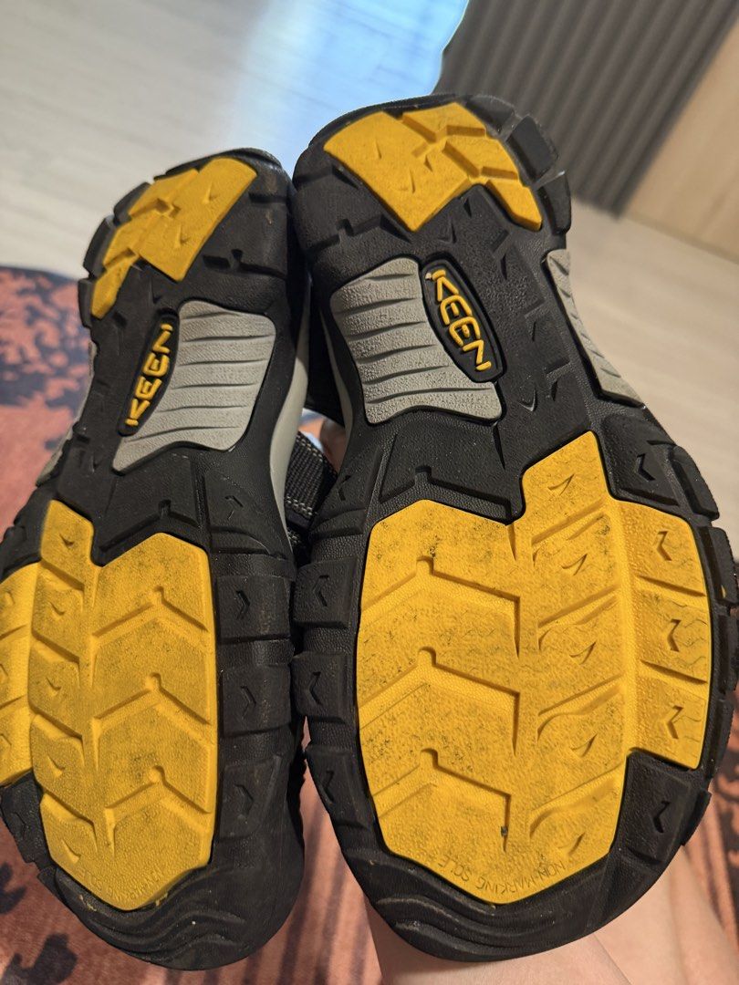 KEEN Newport H2 Water Sandals Men's Size 9 (Category: Casual shoes) located in Singapore. Submitted by jasmine213 (Listing ID 1441987006, Image 2). Description: - KEEN Newport H2 Sandals - Color: Black with Yellow Accents - Size: US Men's 9 - Features: Quick-dry webbing, Lace-lock bungee system - Ideal for: Hiking and water activities - Origin: Made in Cambodia.