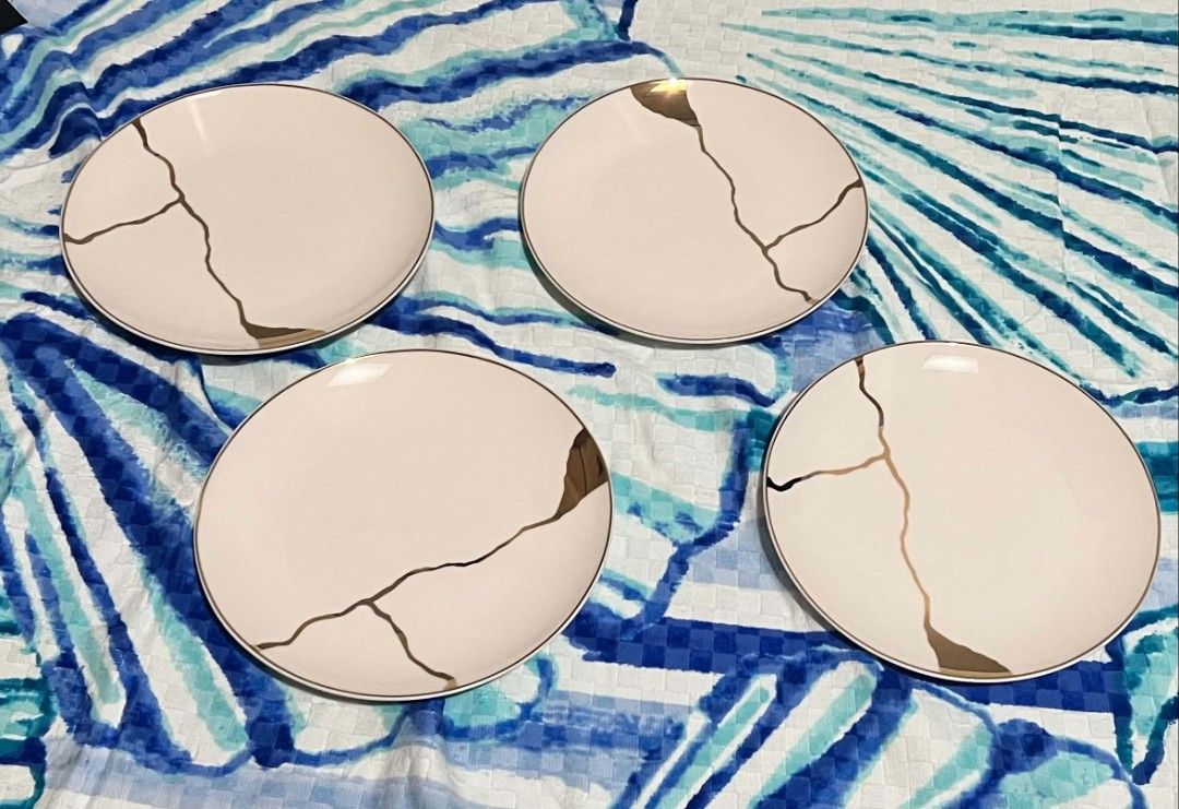 Kintsugi Inspired Ceramic Plates, Bowls, and Cups Set (Category: Dinnerware & Cutlery) located in San Mateo. Submitted by carlinejame_522 (Listing ID 1442127914, Image 2). Description: - Beautiful ceramic dinnerware set - Kintsugi-inspired design with unique gold crackle pattern on each piece - Complete set includes plates, bowls, and cups - Ideal for serving guests or everyday use.