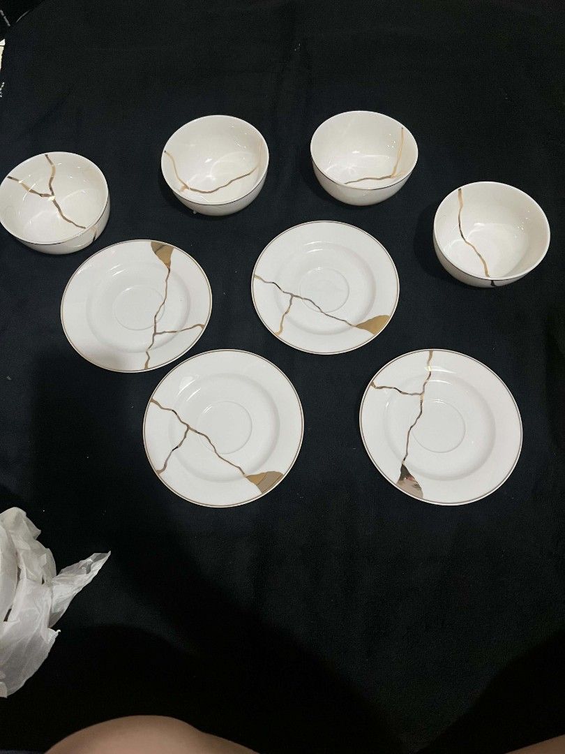 Kintsugi Inspired Ceramic Plates, Bowls, and Cups Set (Category: Dinnerware & Cutlery) located in San Mateo. Submitted by carlinejame_522 (Listing ID 1442127914, Image 3). Description: - Beautiful ceramic dinnerware set - Kintsugi-inspired design with unique gold crackle pattern on each piece - Complete set includes plates, bowls, and cups - Ideal for serving guests or everyday use.