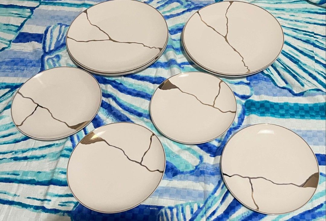 Kintsugi Inspired Ceramic Plates, Bowls, and Cups Set (Category: Dinnerware & Cutlery) located in San Mateo. Submitted by carlinejame_522 (Listing ID 1442127914, Image 1). Description: - Beautiful ceramic dinnerware set - Kintsugi-inspired design with unique gold crackle pattern on each piece - Complete set includes plates, bowls, and cups - Ideal for serving guests or everyday use.