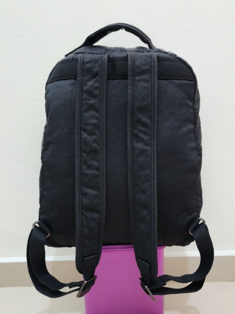 Kipling Backpack (Category: Backpacks) located in Sepang. Submitted by alee73 (Listing ID 1442072717, Image 2). Description: - Classic Kipling backpack - Multiple front zip pockets for easy access - Padded shoulder straps for comfortable carrying - Spacious interior, likely fits a laptop - Perfect for school, work, or everyday adventures - Zippers are in good working condition - Condition 9/10.