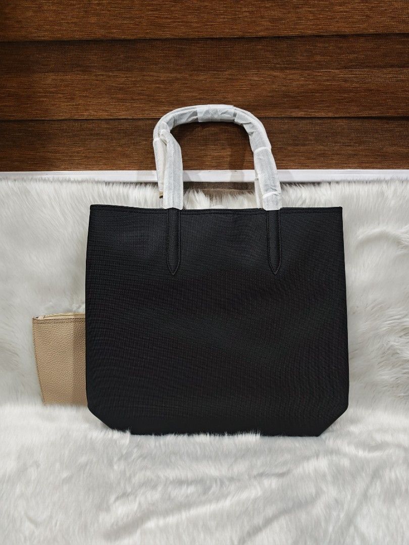 Lacoste Anna Reversible Tote Bag ORIGINAL (Category: Tote Bags) located in Marikina City. Submitted by BrandedStuffz (Listing ID 1442018347, Image 2). Description: Black / beige color. Brand New with complete inclusion. Guaranteed Original and Legit 10000% Moneyback if proven fake. Lalamove Ready. Nationwide shipping via LBC..