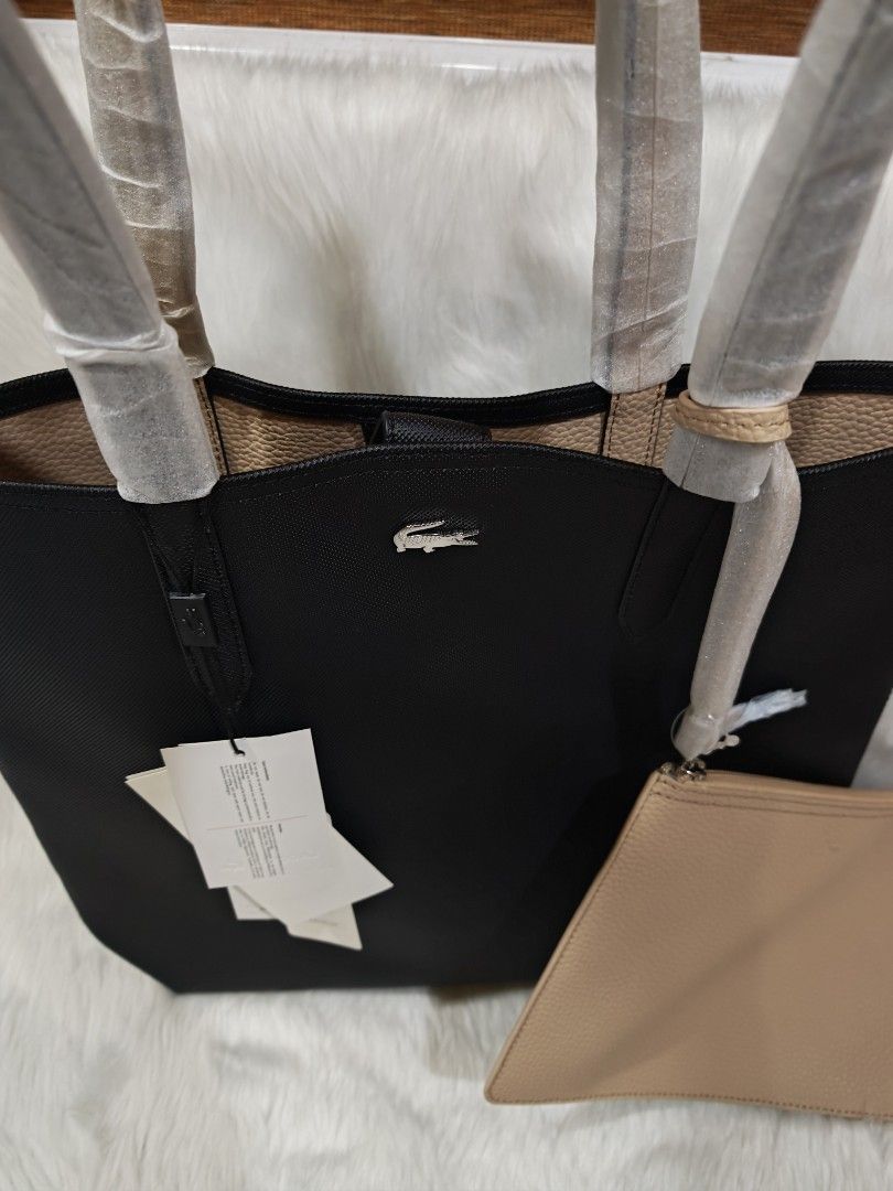 Lacoste Anna Reversible Tote Bag ORIGINAL (Category: Tote Bags) located in Marikina City. Submitted by BrandedStuffz (Listing ID 1442018347, Image 3). Description: Black / beige color. Brand New with complete inclusion. Guaranteed Original and Legit 10000% Moneyback if proven fake. Lalamove Ready. Nationwide shipping via LBC..