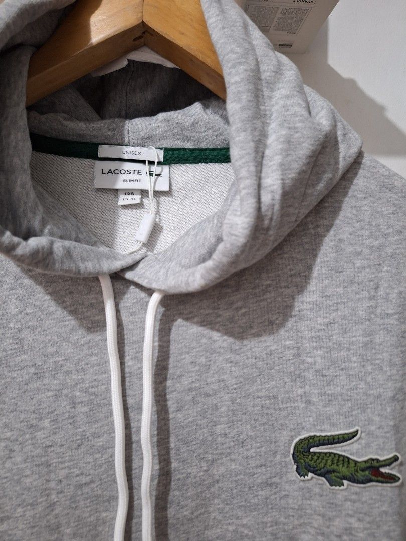 Lacoste pullover hoodie brandnew (Category: Coats, Jackets and Outerwear) located in Muntinlupa City. Submitted by kstefanomela14 (Listing ID 1442153345, Image 2). Description: Lacoste hoodie gray loose fit Brandnew no issue XS - 19x24 Medium - 22x27 XL - SOLD cod cop j&t lalamove lbc.