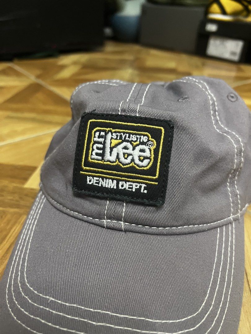 Lee Denim Dept. Grey Baseball Cap (Category: Caps & Hats) located in Manila. Submitted by dommnc (Listing ID 1442064089, Image 2). Description: - Brand: Lee Denim Dept. - Color: Grey - Design: Baseball cap style - Details: White stitching all over, Lee logo patch on front - Features: Adjustable strap at the back - Ideal for: Everyday wear.