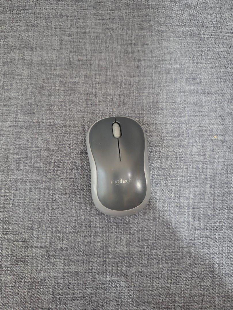 Logitech M185 Wireless Mouse Grey (Category: Mouse & Mousepads) located in Pasig City. Submitted by eco10123 (Listing ID 1442058709, Image 1). Description: No issues.