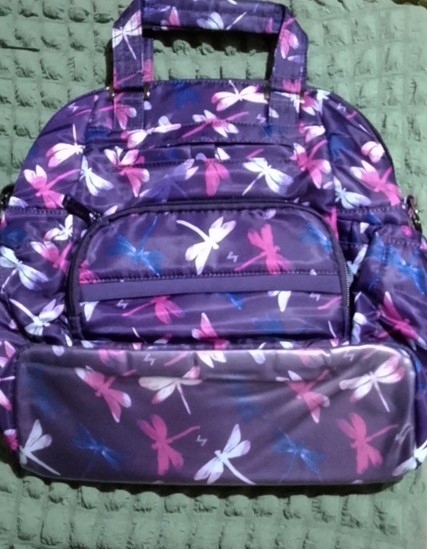 Lug Canter Convertible Shoulder/ Tote Bag (Category: Shoulder Bags) located in Manila. Submitted by rnursecoast08 (Listing ID 1440768989, Image 2). Description: Lug Canter Convertible Tote Bag Dimension: 10.5" W x 12.5"H x 5" D Weight: 1.44 lb Strap length: 29" to 56" Shoulder/ Strap Drop: 10" to 24" Handle Drop: 3" Backpack Strap: 19" to 32" Backpack Strap Drop: 10" to 16" Strap Width: 1.5" Exterior Features: One front soft lined slip pocket wit