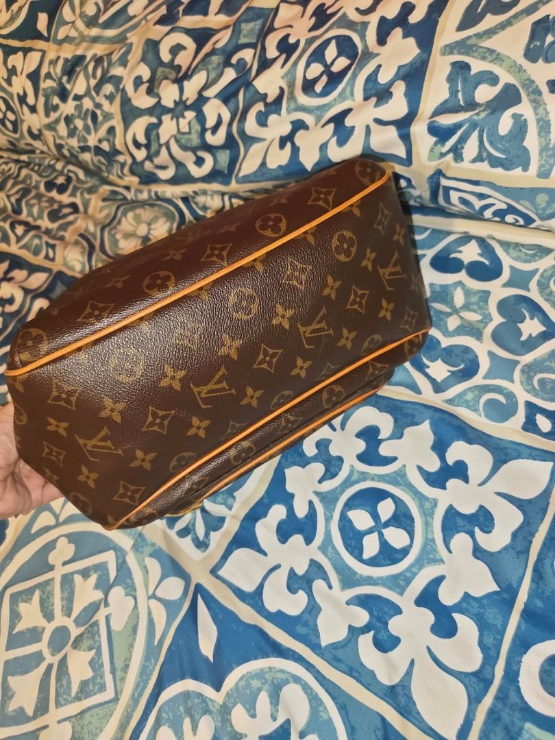 LVuitton Monogram Canvas Tikal GM Bag (Category: Luxury Bags & Wallets) located in Quezon City. Submitted by hellopatchi (Listing ID 1442017391, Image 2). Description: From Negros - Authentic Louis Vuitton Tikal GM Bag - Classic Monogram Canvas - Genuine Vachetta Leather Trim - Secure Zipper Closure - Convenient Interior Pocket - Elegant Gold-Tone Hardware - Perfect shape for everyday use - Please check photos for detailed condition.