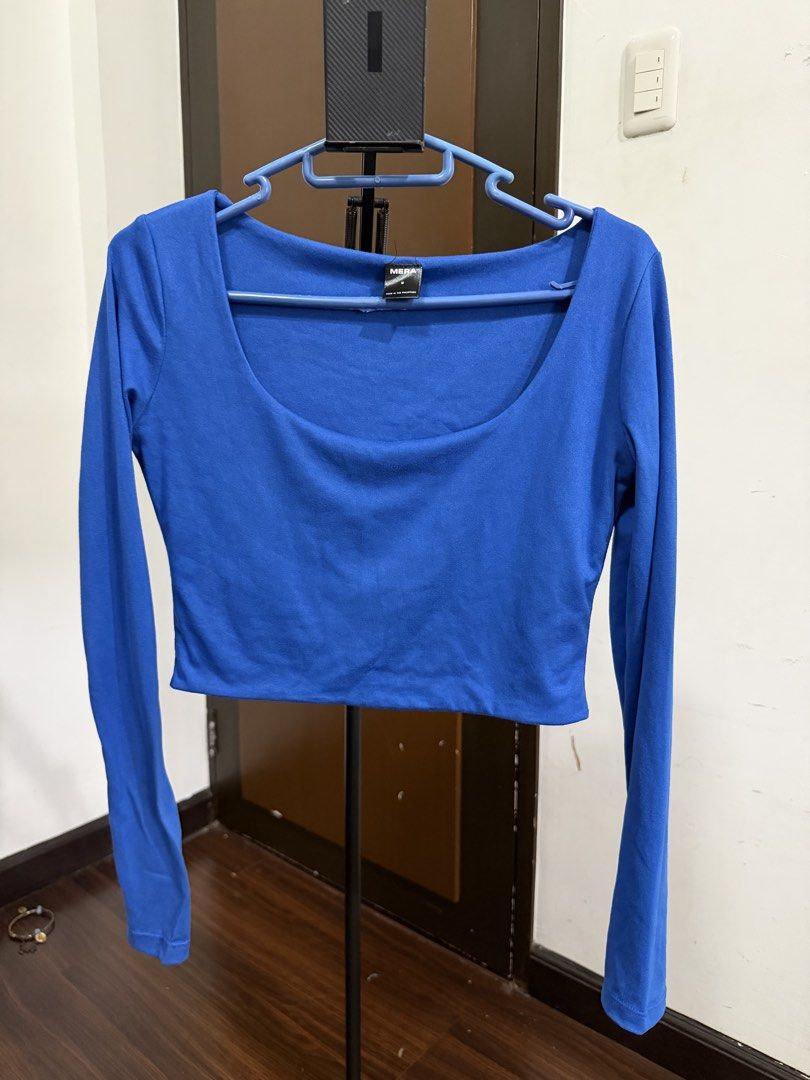 MERA Blue Long Sleeve Cropped Top Size M (Category: Longsleeves) located in Manila. Submitted by mento.ph (Listing ID 1442094817, Image 1). Description: - MERA blue long sleeve cropped top - Scoop neckline - Size: Medium (M) - Locally made in the Philippines - Versatile for layering or standalone wear.