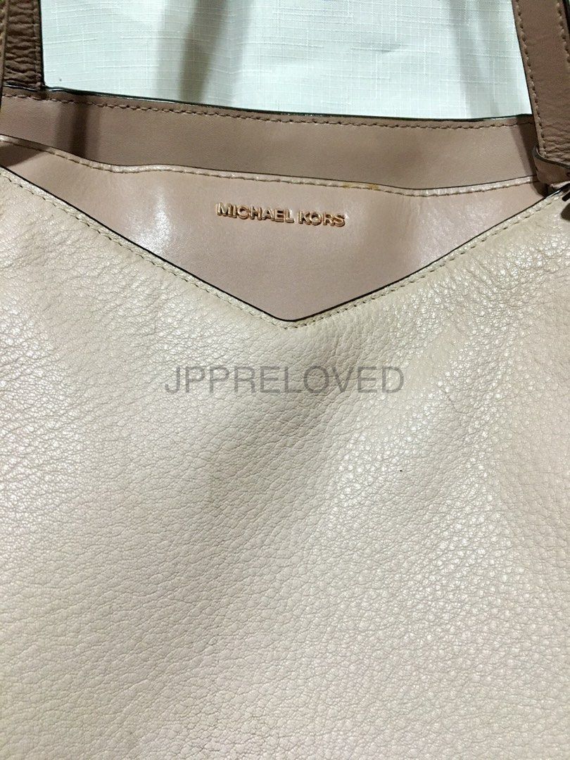 Michael Kors Whitney Pebbled Leather Tote Bag (Category: Luxury Bags & Wallets) located in Bacoor. Submitted by pbmypet (Listing ID 1441994808, Image 2). Description: FIXED PRICE/LAST PRICE - Authentic Michael Kors Whitney Tote Bag Elegant Rose-gold color - 100% Leather - Rose Gold-Tone Hardware (metal) - 17.5”W X 11”H X 7”D - Handle Drop: 11.5” - Exterior Details: Front Slip Pocket - Interior Details: Back Zip Pocket, 2 Back Slip Pockets, 6 Fron