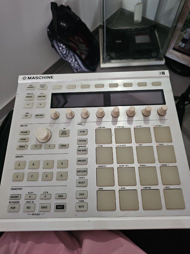 MIDI Controller (Category: Musical Instruments) located in Singapore. Submitted by wan_jajan (Listing ID 1442054359, Image 1). Description: - Native Instruments Maschine MK1 - Ideal for music production & beat making - Features pads, knobs, and buttons for software control - USB powered - MIDI IN/OUT ports included - Tested and confirmed working - Ready for your studio setup come with the stand.