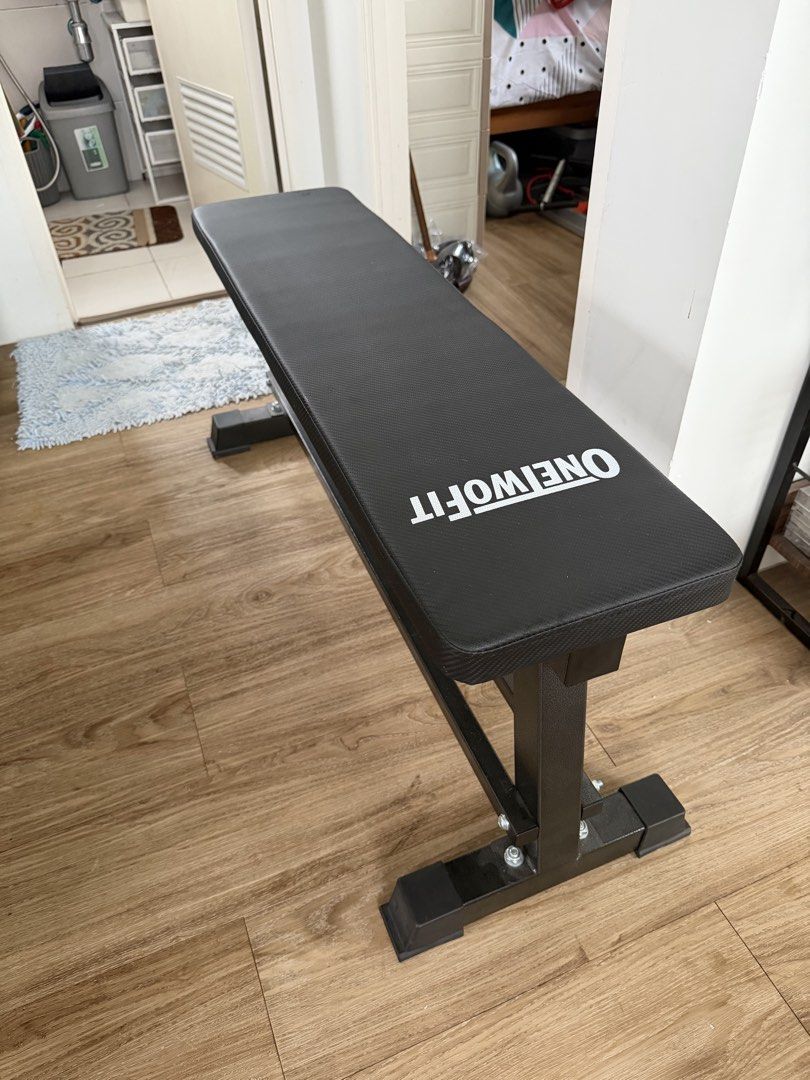 ONE TWO FIT Flat Weight Bench for Home Gym (Category: Weights & Dumbbells) located in Pasig City. Submitted by lortega (Listing ID 1441997600, Image 3). Description: - ONE TWO FIT Flat Bench - Ideal for home workouts - Sturdy and reliable construction - Easy to store - Perfect for lifting and bodyweight exercises RFS: Decluttering. .