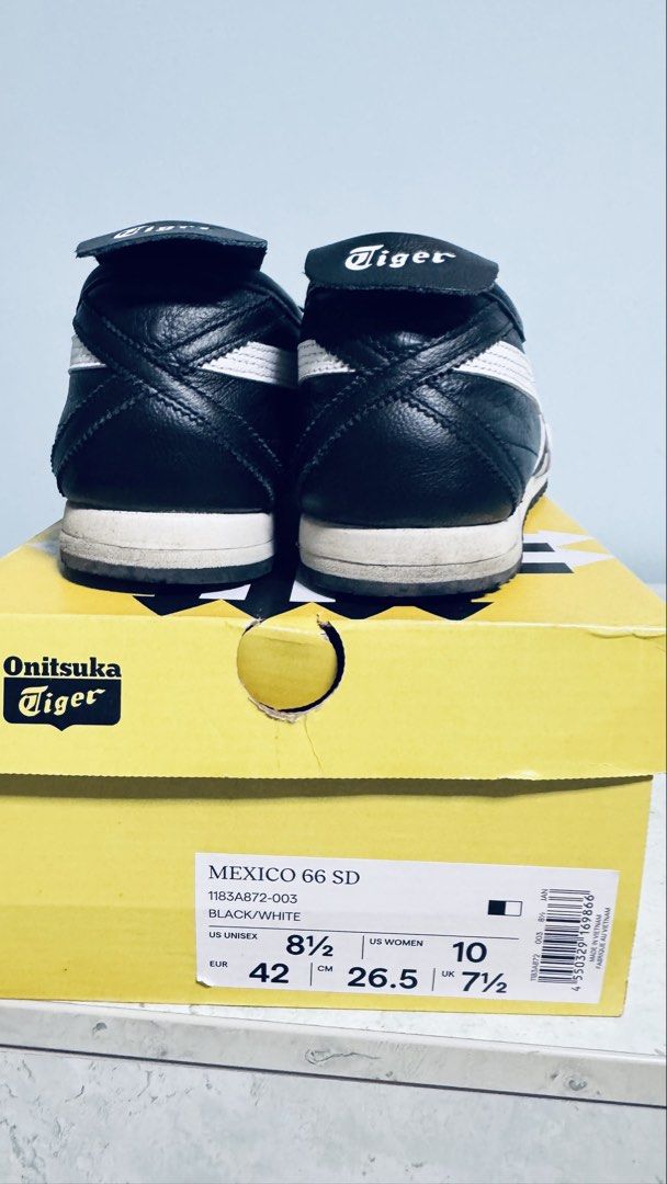 Onitsuka Tiger Mexico 66 SD Black White Leather Sneakers (Category: Sneakers) located in Singapore. Submitted by ivylim_m (Listing ID 1441983544, Image 2). Description: - Classic Onitsuka Tiger Mexico 66 SD sneakers - Color: Black leather with white stripes - Size: US unisex 8.5 / US Women's 10 / EUR 42 - Includes original box - see pics for conditions of the shoes - Bought from Onisuja store takashmaya in 2025 - worn only a few times .
