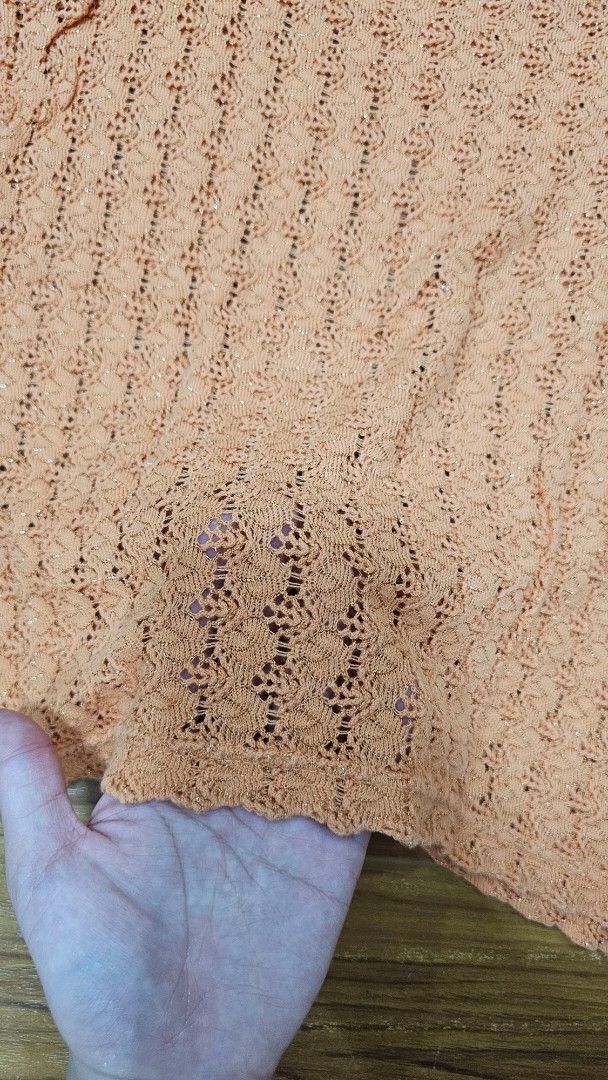 Orange Crochet Knit Spaghetti Strap Tank Top (Category: Sleeveless) located in Caloocan City. Submitted by jadorearchive (Listing ID 1442092179, Image 3). Description: - Orange crochet knit tank top - Features delicate spaghetti straps - Slightly sheer knit pattern - Perfect for beach trips or casual outings.