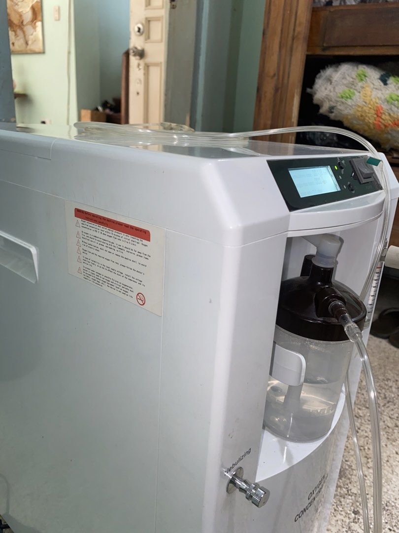 Oxygen Concentrator (Category: Medical Supplies & Tools) located in Manila. Submitted by tavorafrancis8096 (Listing ID 1442075276, Image 3). Description: - White oxygen concentrator - Digital display for easy monitoring - Adjustable flow meter - Includes humidifier bottle and tubing - Ready to use for home oxygen therapy.