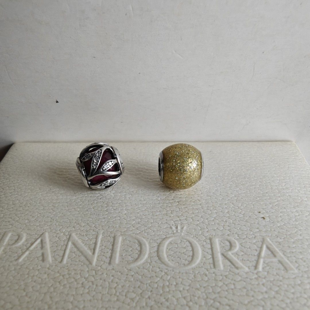 Pandora charms (Category: Charms) located in Makati City. Submitted by ly12eb (Listing ID 1442068211, Image 2). Description: Authentic Very good to excellent condition Nature's radiance euc 1.7k Gold glitter ball very good condition 1.1k -dark gold color, faded hallmarks.