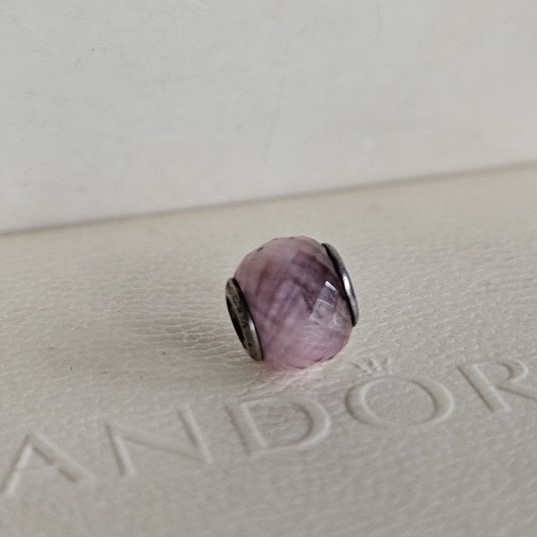 Pandora geometric facet pink charm (Category: Charms) located in Makati City. Submitted by ly12eb (Listing ID 1442008689, Image 2). Description: Authentic Excellent condition but with dark stain inside.