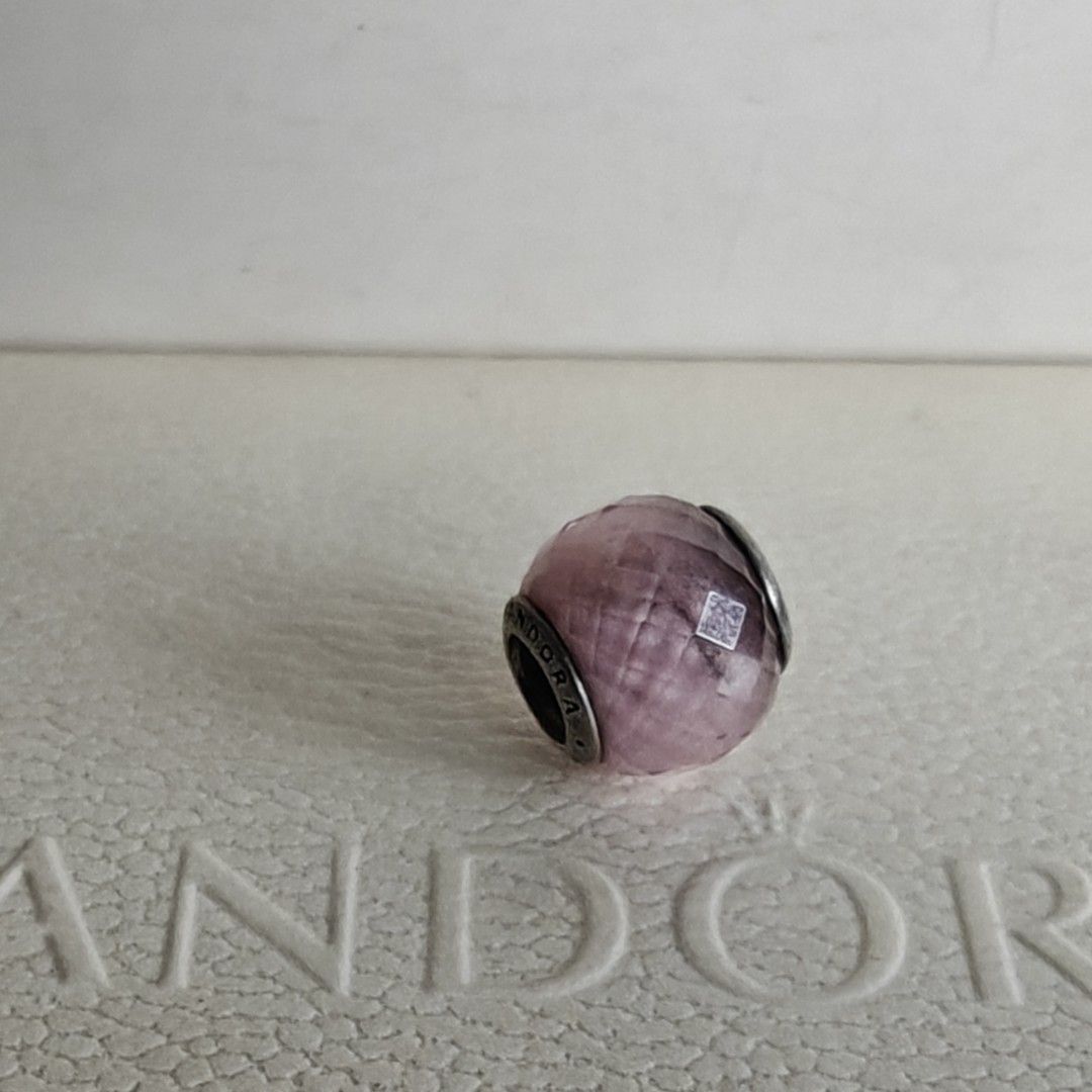 Pandora geometric facet pink charm (Category: Charms) located in Makati City. Submitted by ly12eb (Listing ID 1442008689, Image 1). Description: Authentic Excellent condition but with dark stain inside.