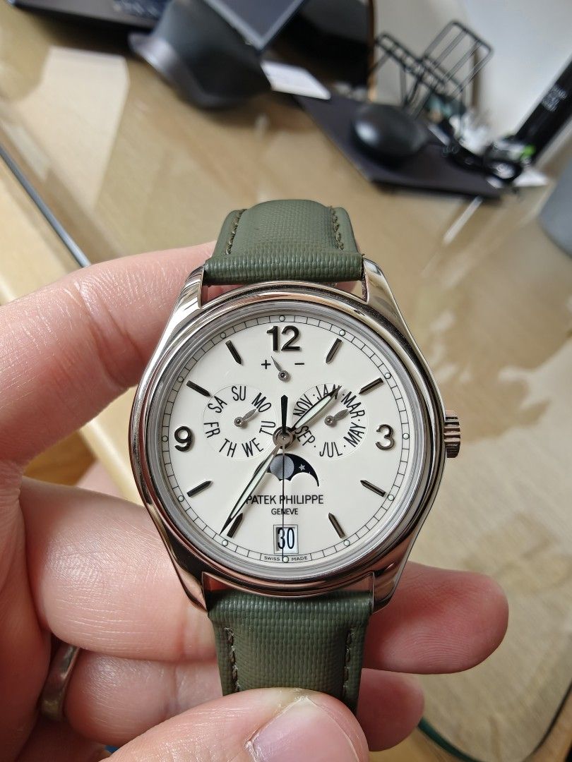 Patek Philippe Annual Calendar 5146G Ivory / Cream Dial 2016 Dated (Category: Watches) located in Singapore. Submitted by kylitos (Listing ID 1442111301, Image 2). Description: Watch only with close-up photos taken by PP Service Centre for application of archive extracts. Unpolished condition, 2016 Model with PP seal on movement. White gold case with white gold calatrava cross deployant on custom alligator strap. Last serviced at WatchLab in Mar 