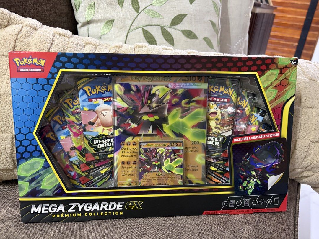 Pokemon TCG Mega Zygarde EX Premium Collection Box (Category: Card Boxes & Cases) located in Quezon City. Submitted by ceecee007 (Listing ID 1441981303, Image 1). Description: - Sealed Pokemon Mega Zygarde EX Premium Collection box - Includes booster packs - Features a Mega Zygarde EX card - Comes with a reusable sticker - Perfect for Pokemon fans and collectors - All items are sealed inside the box.