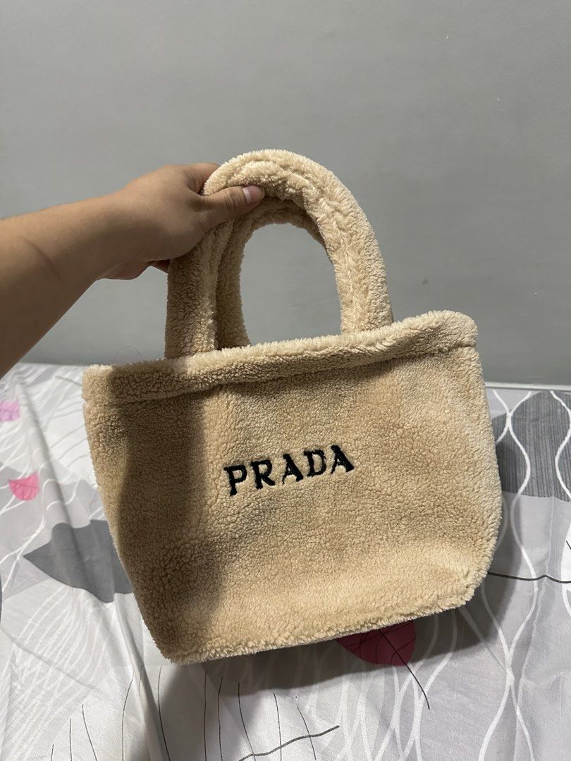 Prada beaute teddy sherpa mini tote bag (Category: Tote Bags) located in Baliuag. Submitted by katebartolo12 (Listing ID 1442071950, Image 1). Description: Gift with purchase .