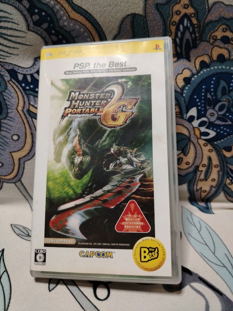 PSP Monster Hunter Portable 2nd G UMD Game Capcom (Category: PlayStation) located in Quezon City. Submitted by 09277011179 (Listing ID 1442070826, Image 1). Description: - Monster Hunter Portable 2nd G for PSP - 'PSP the Best' edition - Includes original UMD disc and case - Japanese version - Classic action RPG experience.