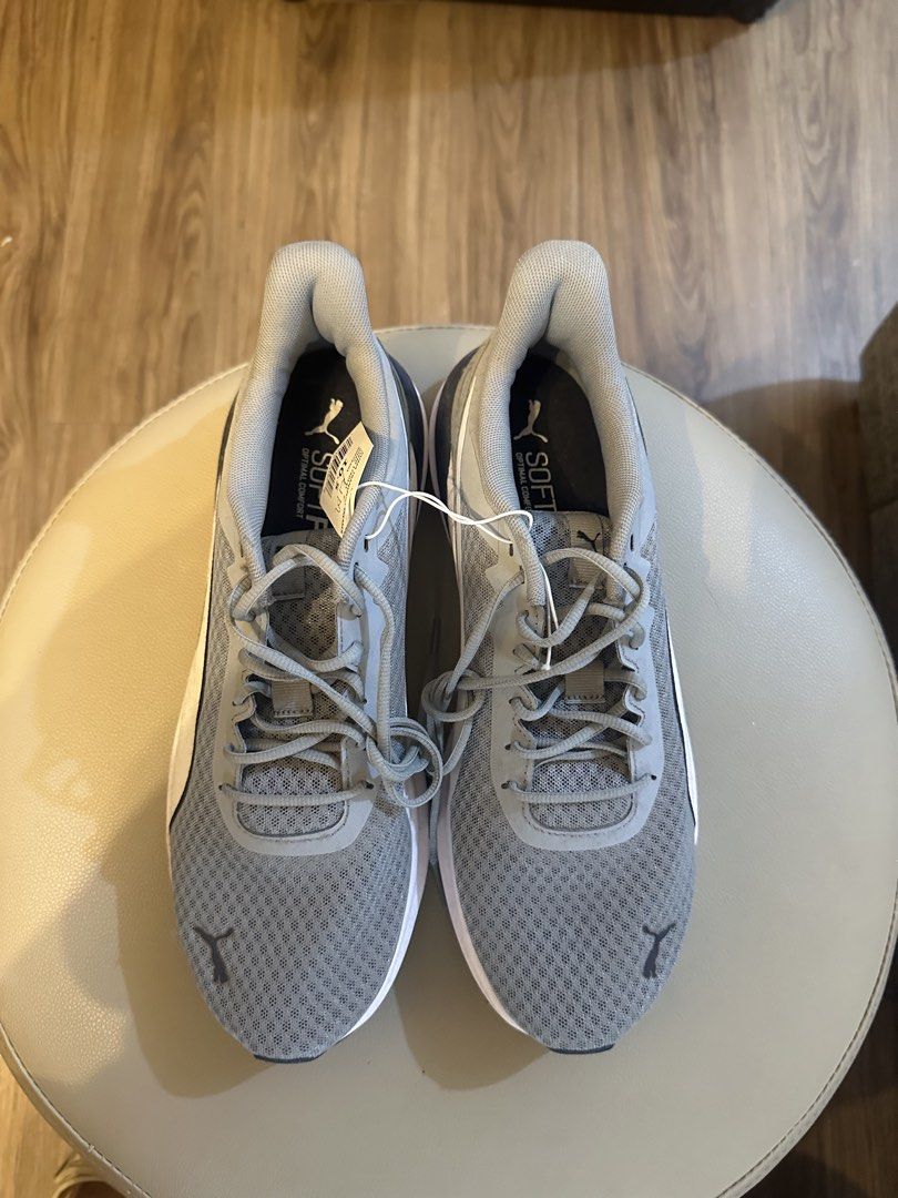 Puma SoftFoam Running Shoes Grey White (Category: Sneakers) located in Cavite. Submitted by kaydacanay (Listing ID 1442080803, Image 1). Description: - Grey Puma running shoes with white accents - SoftFoam cushioning for ultimate comfort - Secure lace-up closure - Ideal for running, workouts, or everyday casual wear - Brand new with tags still attached.