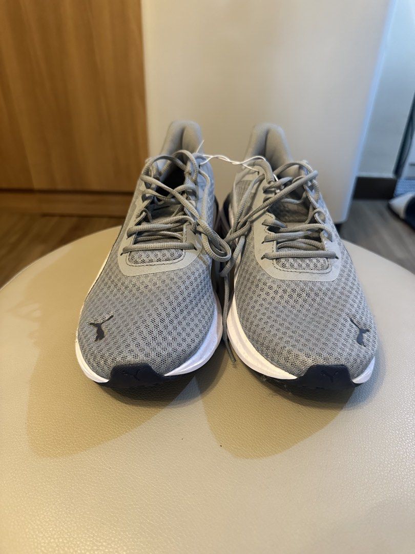 Puma SoftFoam Running Shoes Grey White (Category: Sneakers) located in Cavite. Submitted by kaydacanay (Listing ID 1442080803, Image 2). Description: - Grey Puma running shoes with white accents - SoftFoam cushioning for ultimate comfort - Secure lace-up closure - Ideal for running, workouts, or everyday casual wear - Brand new with tags still attached.