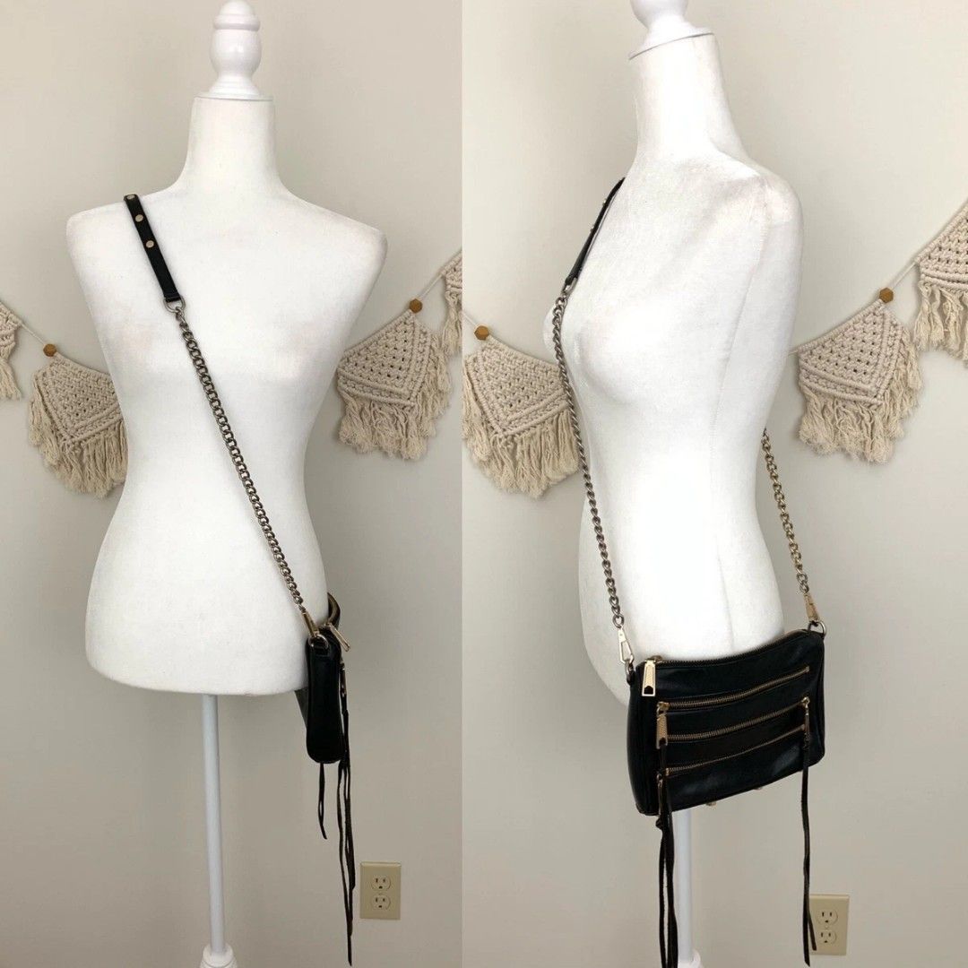 Rebecca Minkoff Black Leather Crossbody Bag (Category: Cross-body Bags) located in Pasig City. Submitted by healthnfeshn (Listing ID 1442052077, Image 3). Description: - Genuine black leather crossbody bag - Multiple zippered pockets on the front for easy access - Elegant silver hardware and chain strap - Decorative leather tassels on zippers - Ideal for everyday use and errands.