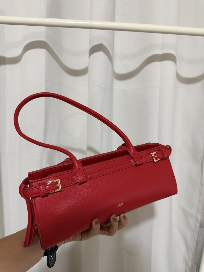 HUE Eastwest Terra Bag (Category: Shoulder Bags) located in Pasig City. Submitted by declutterwithe (Listing ID 1441980015, Image 3). Description: HUE Manila Eastwest Terra Bag - Features gold buckle details on the sides - Zipper closure at the top - Adjustable strap - Ideal for everyday use or a night out - Fits essentials - Clean interior.