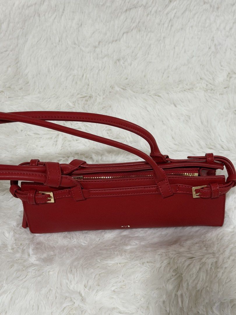 HUE Eastwest Terra Bag (Category: Shoulder Bags) located in Pasig City. Submitted by declutterwithe (Listing ID 1441980015, Image 2). Description: HUE Manila Eastwest Terra Bag - Features gold buckle details on the sides - Zipper closure at the top - Adjustable strap - Ideal for everyday use or a night out - Fits essentials - Clean interior.