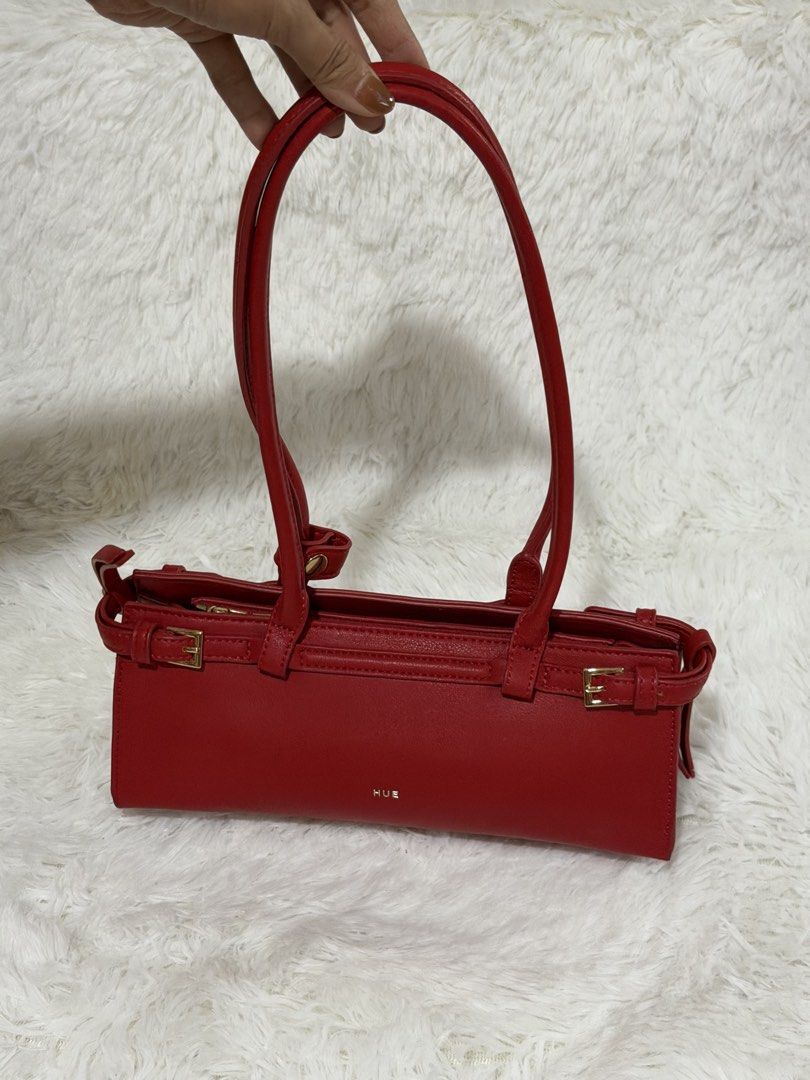 HUE Eastwest Terra Bag (Category: Shoulder Bags) located in Pasig City. Submitted by declutterwithe (Listing ID 1441980015, Image 1). Description: HUE Manila Eastwest Terra Bag - Features gold buckle details on the sides - Zipper closure at the top - Adjustable strap - Ideal for everyday use or a night out - Fits essentials - Clean interior.