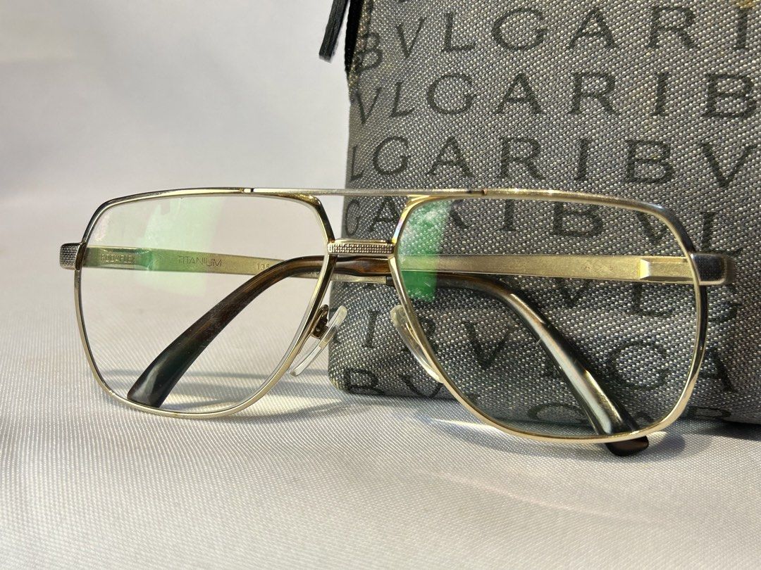 RODAFLEX Titanium Aviator Eyeglasses Frame (Category: Sunglasses & Eyewear) located in Manila. Submitted by originalvintagebagph (Listing ID 1442150511, Image 2). Description: - Brand: RodaFlex - Style: Aviator Eyeglasses - Frame Material: Titanium - Frame Color: Gold-tone metal - Arm Detail: Dark brown gradient - Included Accessory: BVLGARI pouch - Suitability: Great for prescription lenses.