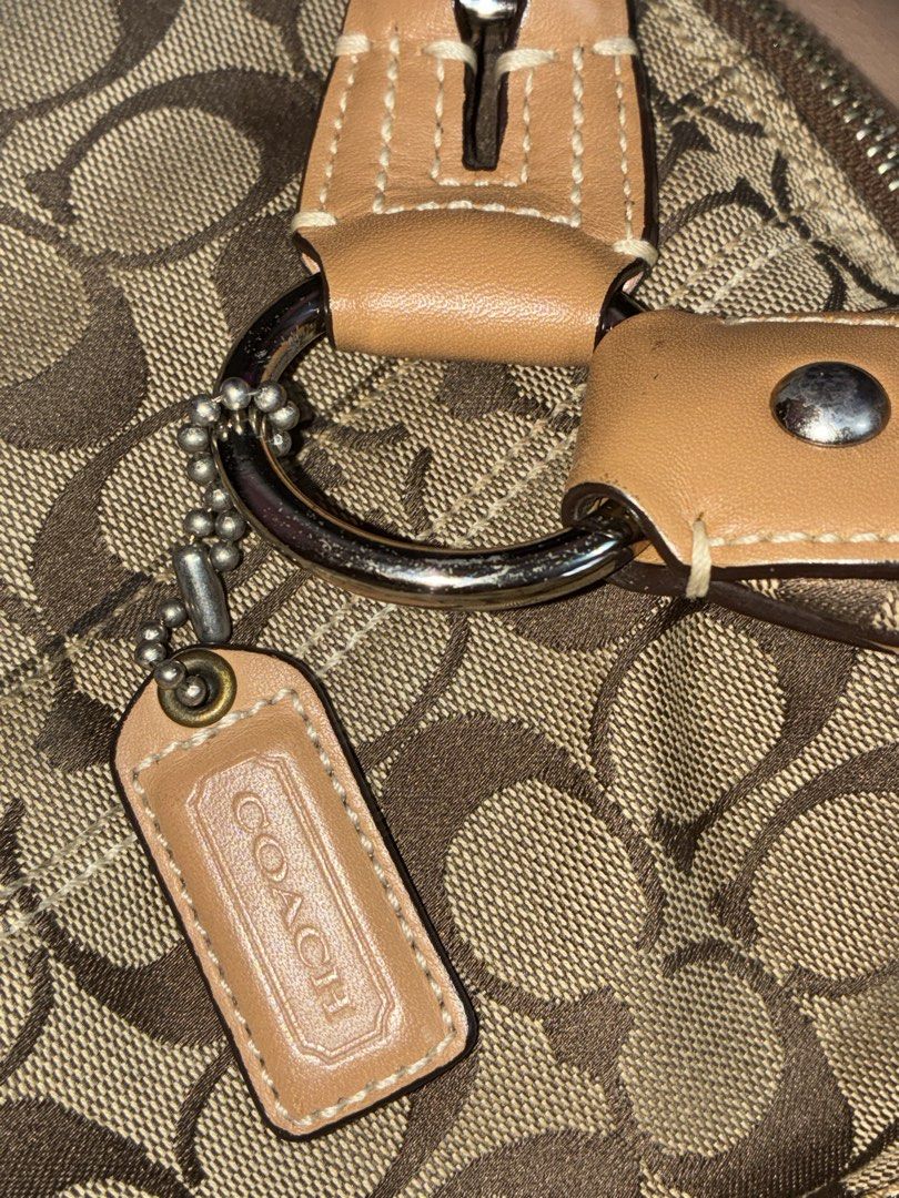 [RUSH] RARE Coach Hobo Shoulder Bag (Category: Luxury Bags & Wallets) located in Quezon City. Submitted by _stphnlswardrobe (Listing ID 1442027543, Image 3). Description: Brand: Coach Size: Medium Bag Condition: Like New Note: Paint Stain (in photo); Bought for ₱8k, selling for only ₱5k MOD: Lalamove, GGX ONLY MOP: GCash, Maya ONLY Loc: QC.