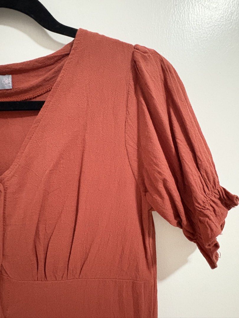 Rust Orange Button-Up Puff Sleeve Midi Dress (Category: Dresses) located in San Fernando. Submitted by lovedby.ct (Listing ID 1442067720, Image 2). Description: -Used but not abused - Rust orange midi dress .