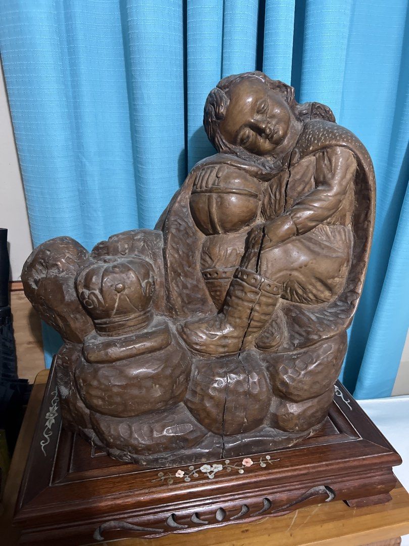 Sleeping Sto. Niño attributed to Maximo Vicente solid wood statue (Category: Religious Items) located in Paranaque City. Submitted by decluttering1990 (Listing ID 1442076796, Image 1). Description: Php 8,500 Negotiable for sure buyers Solid wood; with crack due to age Attributed to Maximo Vicente 17 inches high.