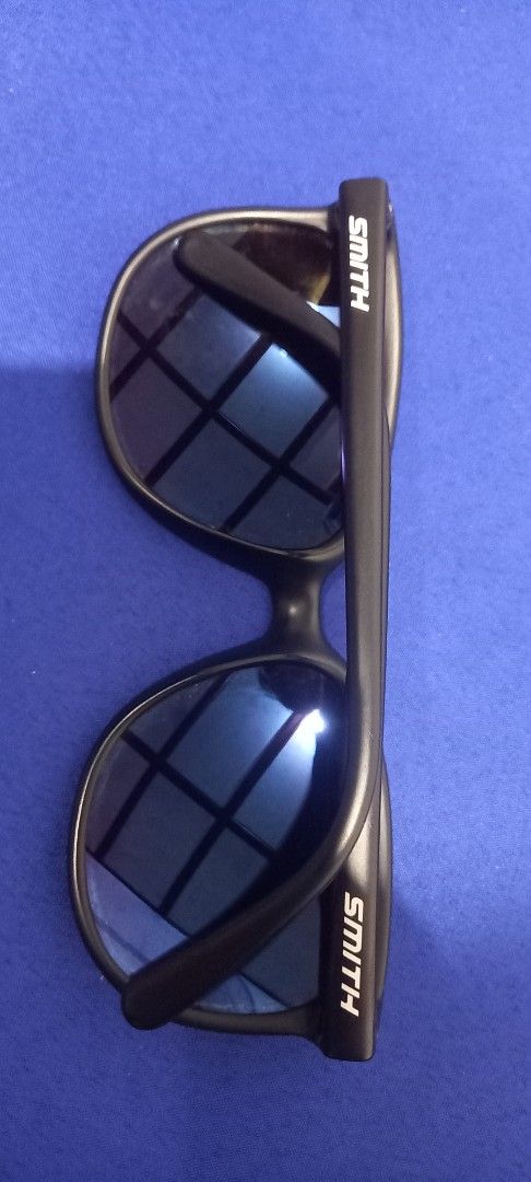 Smith Sunglasses Black Frame Mirrored Lenses (Category: Sunglasses & Eyewear) located in Manila. Submitted by fmpc7878 (Listing ID 1442077605, Image 3). Description: - Classic black Smith sunglasses - Mirrored lenses for a stylish look - Smith logo featured on arms and lens - Ideal for sunny days - Provides stylish eye protection AS IS USED CONDITION.