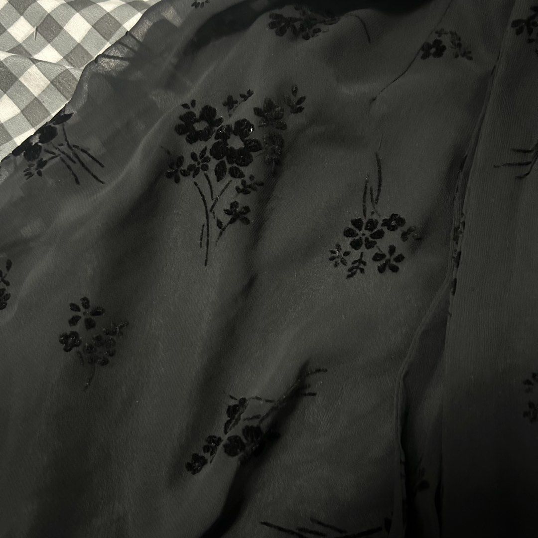 Snidel Black Floral Wrap Skirt (Category: Skirts) located in Manila. Submitted by worstdumpling (Listing ID 1442085990, Image 3). Description: - Brand: Snidel - Type: Black wrap skirt - Design: Delicate floral burnout pattern - Material: Sheer overlay with satin lining - Closure: Tie waist - Style: Super cute, versatile for dressing up or down.