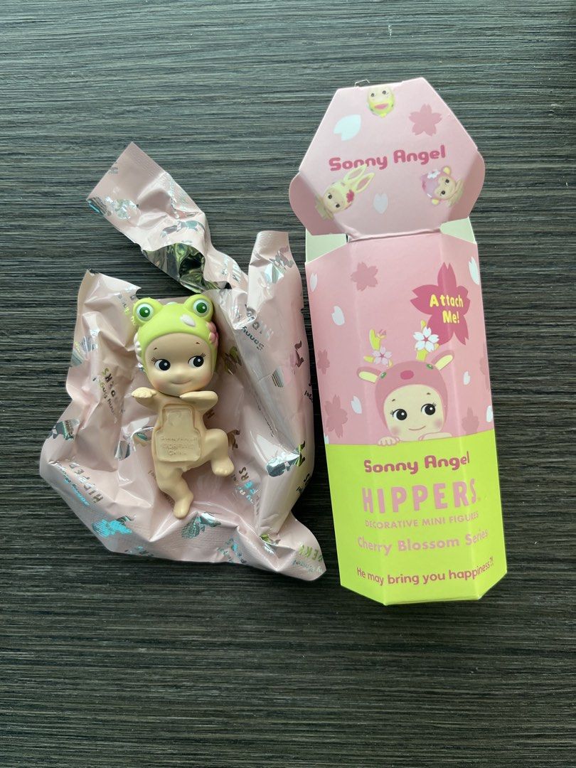 sonny angel hipper - cherry blossom series - frog (Category: Designer & Blind Box Toys) located in Singapore. Submitted by chloe1949 (Listing ID 1442027634, Image 1). Description: - Sonny Angel Hipper figure - Cherry Blossom Series - Frog design - Comes in original packaging and box - Ideal for collectors or as a cute desk decoration - May bring you happiness!.