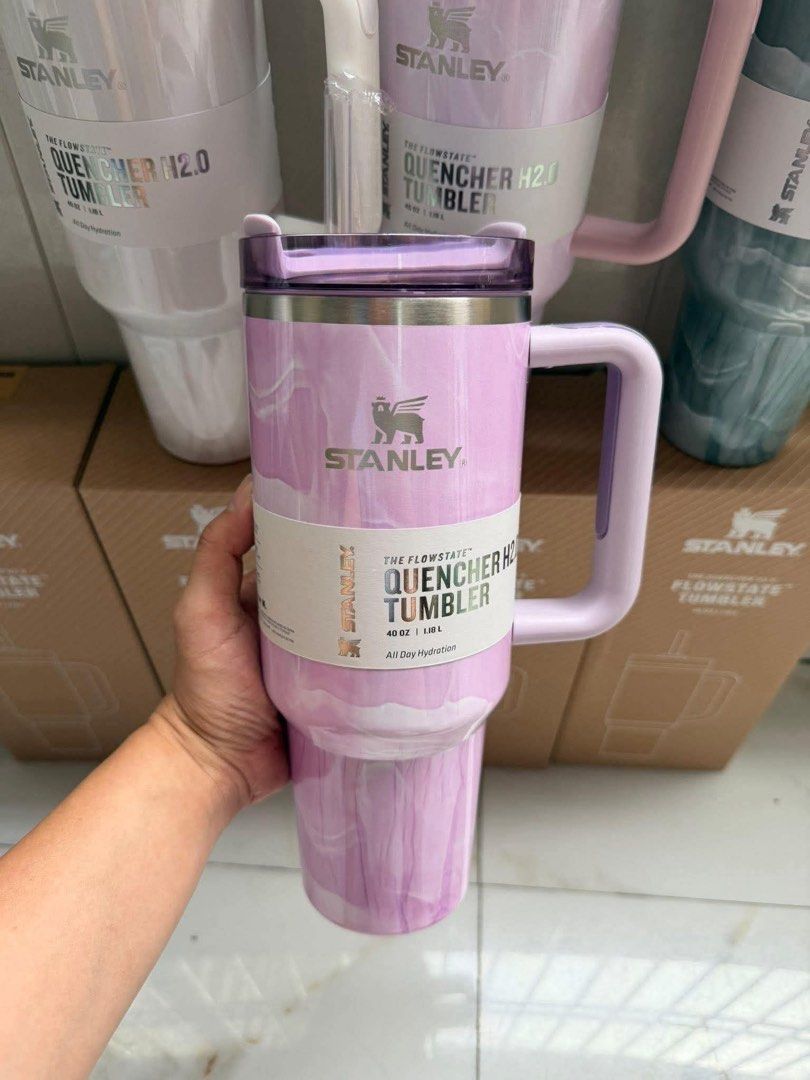 Stanley Quencher H2.0 Flowstate Tumbler 40oz Marble Swirl (Category: Water Bottles & Tumblers) located in Manila. Submitted by declutbykai (Listing ID 1441982337, Image 1). Description: - Stanley Quencher H2.0 Flowstate Tumbler with Box - 40 oz capacity - Keeps drinks cold all day - Includes reusable straw and handle - Available in marble swirl patterns: pink, white, and green STOCK AVAILABLE .