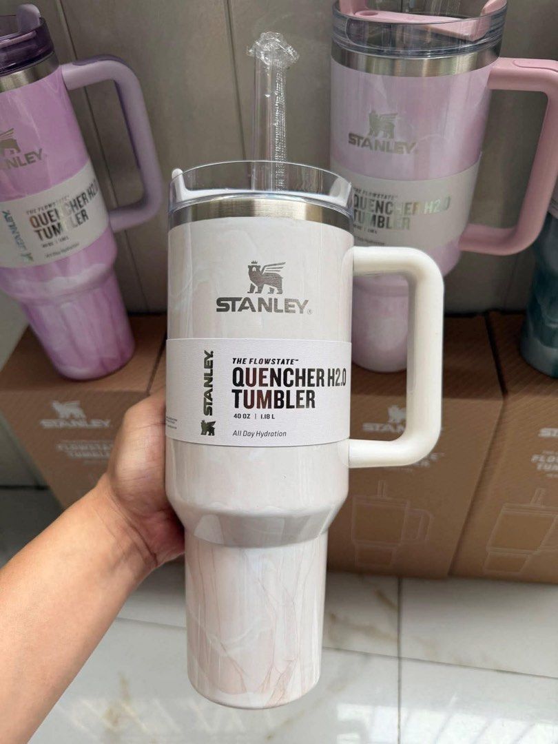 Stanley Quencher H2.0 Flowstate Tumbler 40oz Marble Swirl (Category: Water Bottles & Tumblers) located in Manila. Submitted by declutbykai (Listing ID 1441982337, Image 2). Description: - Stanley Quencher H2.0 Flowstate Tumbler with Box - 40 oz capacity - Keeps drinks cold all day - Includes reusable straw and handle - Available in marble swirl patterns: pink, white, and green STOCK AVAILABLE .