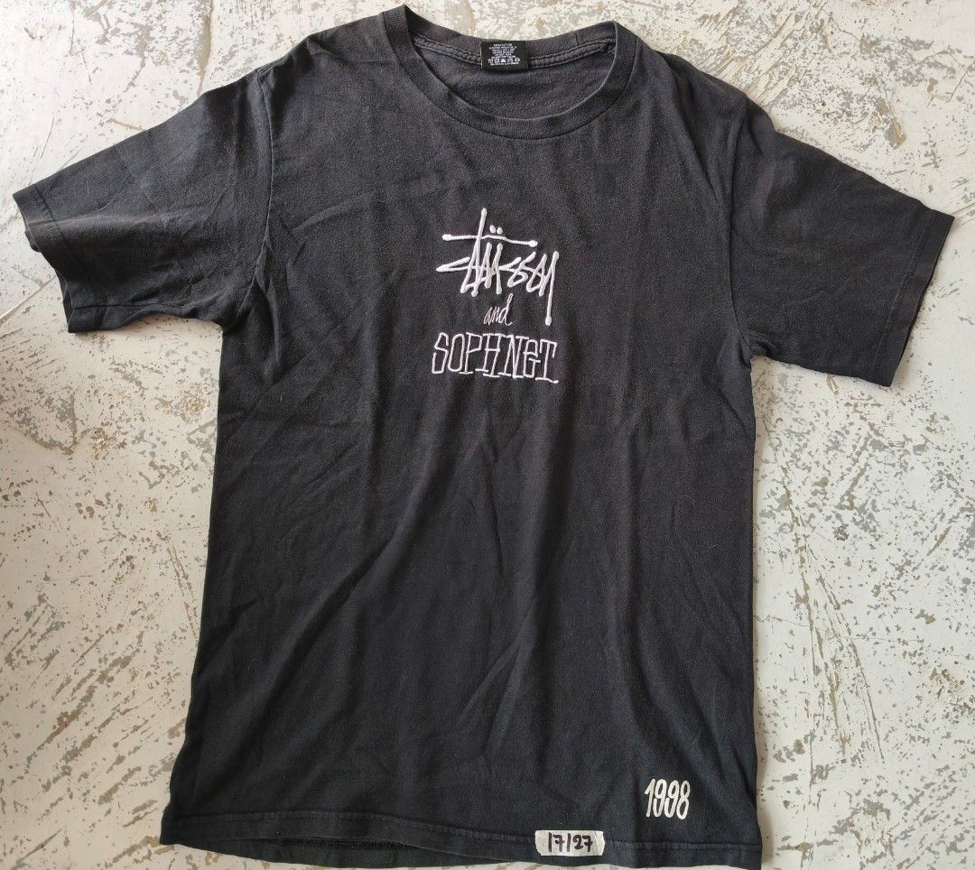 Stussy and Sophnet Tee shirt (Category: Tshirts & Polo Shirts ) located in Cabadbaran. Submitted by jem1124 (Listing ID 1442021213, Image 1). Description: 17.5x27 embroidered design Good condition even fade issue: cracked print on 1998 print.