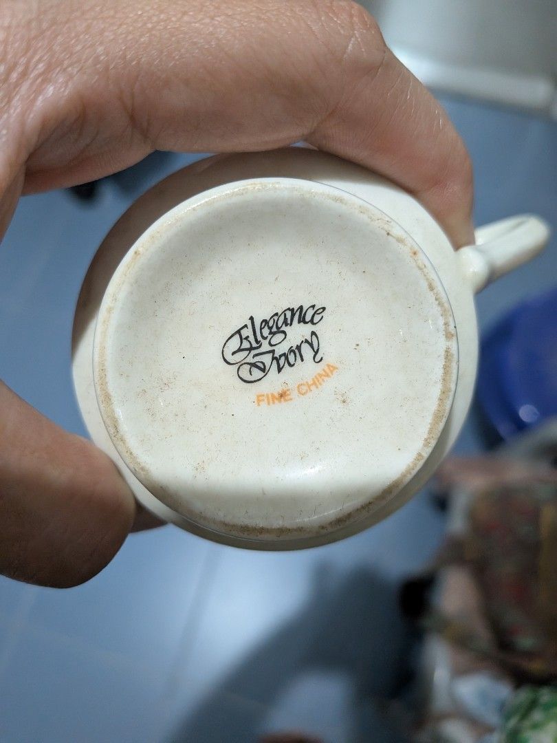 Tea cups with serving plates473655753259110401