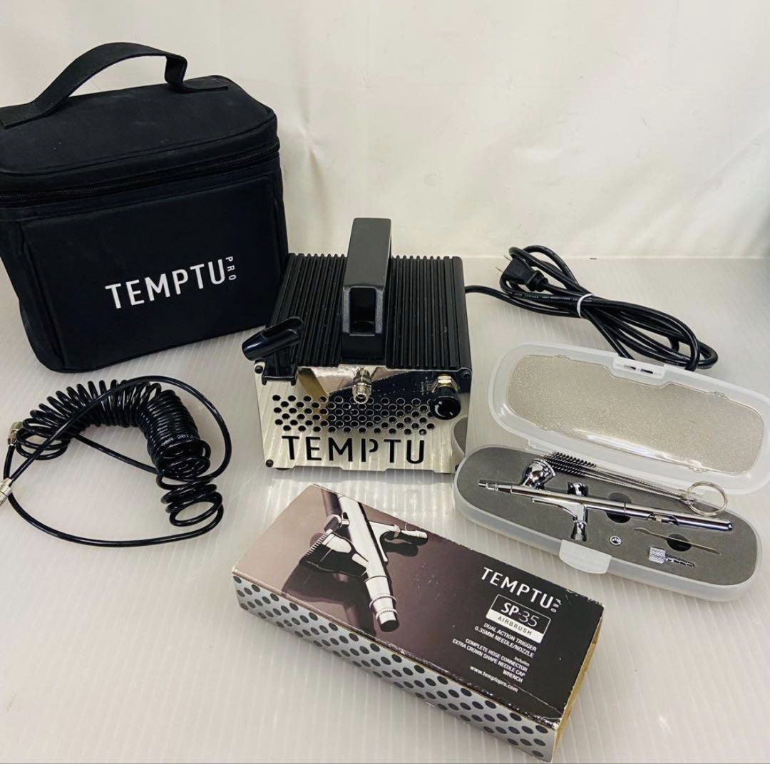 Temptu SP-35 Airbrush Makeup System with Compressor and Accessories (Category: Makeup) located in Naga. Submitted by perperrrro (Listing ID 1442135499, Image 1). Description: TEMPTU PRO SP-35 Airbrush Kit Used only once. It is in like-new condition and very clean (bought last february) This is a professional airbrush makeup set that includes a dual-action airbrush with a 0.35mm needle/nozzle, a dedicated compressor, and Temptu DURA liquid bottles