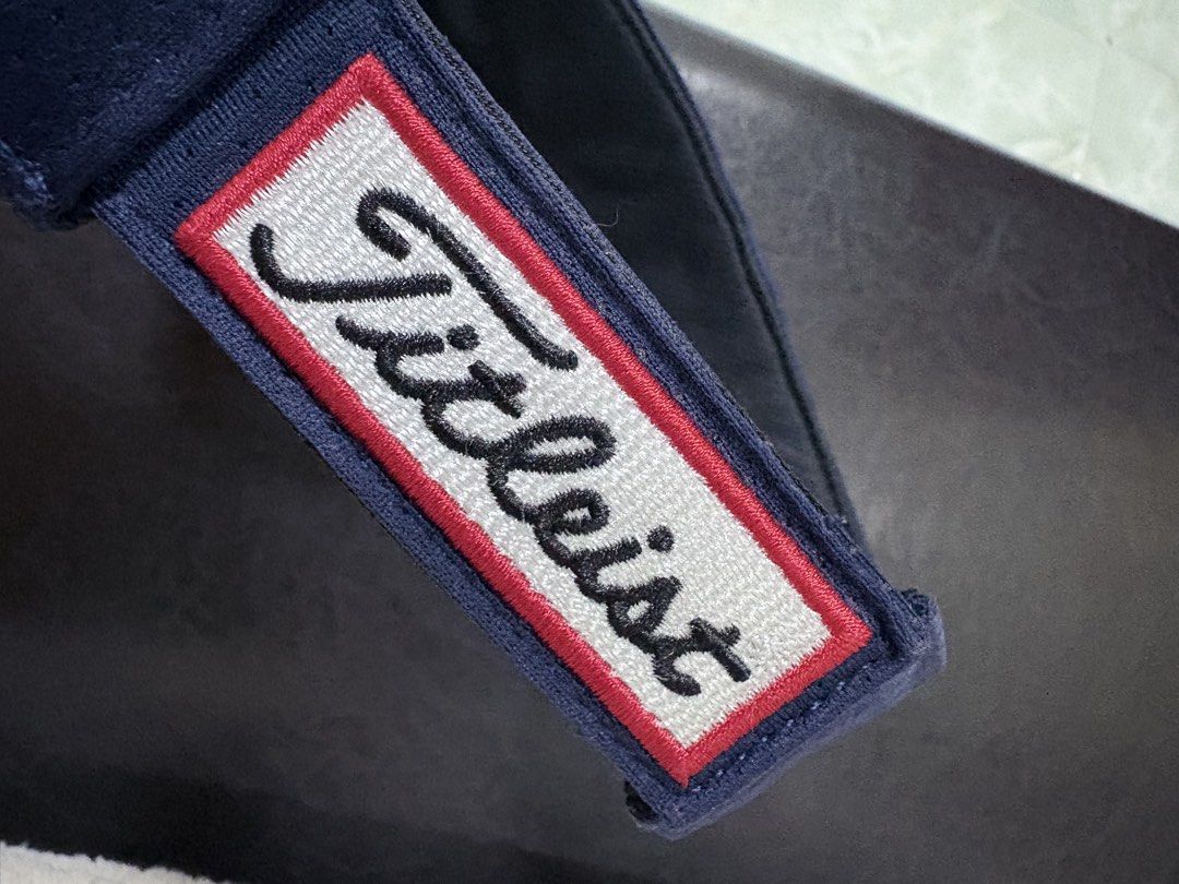 Titleist Golf Visor Navy Blue (Category: Caps & Hats) located in Quezon City. Submitted by viee04 (Listing ID 1442017322, Image 3). Description: - Navy blue Titleist visor - Embroidered logo on the front - Adjustable strap for a comfortable fit - Ideal for golf and outdoor activities - Provides sun protection for your eyes - Classic and simple design.